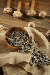 DRİED NUTS AND FRUİTS IN WOODEN BOWL ON BROWN FLOOR
