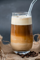 Coffee with foam on a dark background