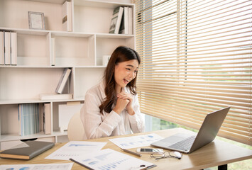 Obraz premium Young woman Working from Home, Video Call with Customer in Office, Remote Business Communication, Telecommuting Professional, Virtual Video Call with Office Customer, Work from Home Concept.