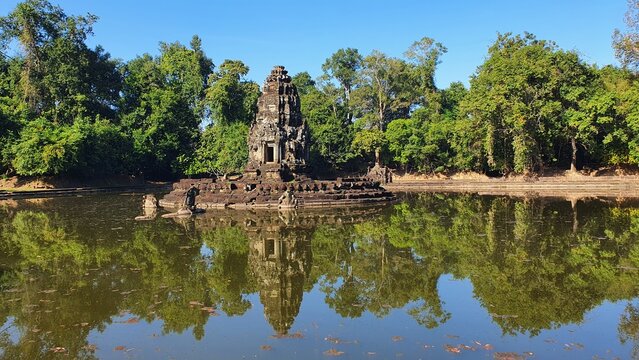 Neak Pean (or Neak Poan) at Angkor, Cambodia is an artificial island with a Buddhist temple on a circular island in Jayatataka Baray.