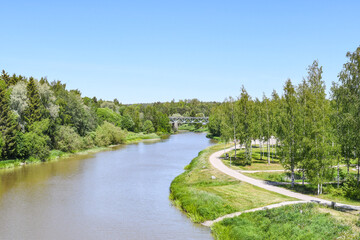 Fototapeta na wymiar Countryside landscape with river in early summer