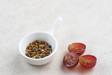 Biji Anggur, heap of grape seeds
