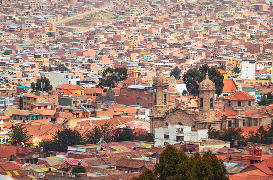 Distant view of the roofs and houses in Potosi city an the Cathedral Basilica of Our Lady of Peace. Bolivia, Southamerica. 