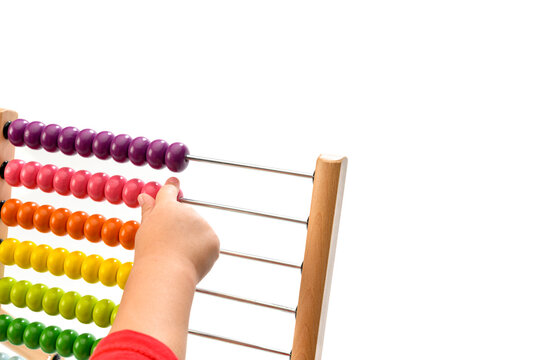 child playing with abacus