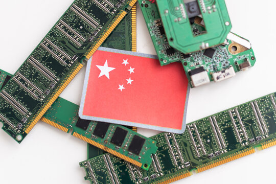 China flag in the center of a circuit board. Concept of leadership in technology, artificial intelligence or digital cryptocurrencies
