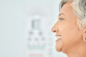 Side profile, face and mockup of a woman for optometry, vision test and exam for healthcare. Smile, medical and a mature person or customer at a clinic for service, wellness and space for eye care © Ilzer/peopleimages.com