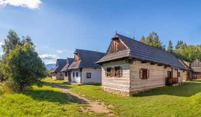 Fototapeta na wymiar log cabin - village with traditional wooden house at Museum of the Slovak Village, Martin, Slovakia