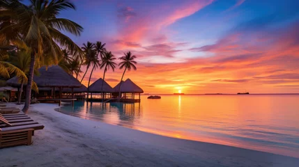 Fototapeten Experience the tranquil beauty of a sunset over a palm-fringed beach, where the sea meets the tropical sky in a stunning silhouette © STORYTELLER