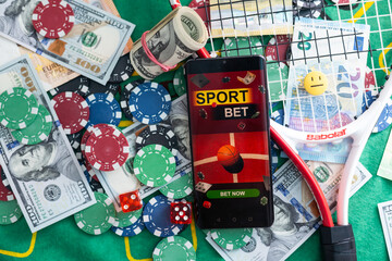 Gambling online casino Internet betting concept green screen. smartphone with poker chips, dice....