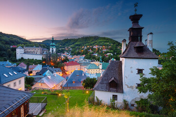 Banska Stiavnica, Slovakia. Cityscape image of historical city of Banska Stiavnica, Slovak Republic at summer sunset. - 636272799
