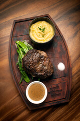 rib eye beef steak with butter sauce and gravy - 636274162