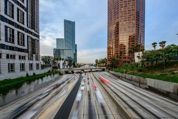 Fototapeta na wymiar Dawning Urban Energy: 4K Image of Los Angeles Downtown and Morning Traffic at Sunrise