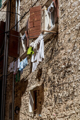 Picturesque houses with washing on line in the Old Town, Rovinj, Istria, Croatia