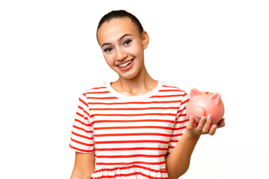 Young Arab woman holding a piggybank over isolated background with surprise and shocked facial expression
