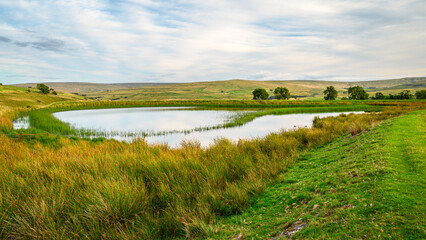Westgate Tarn from the north, also called West Slitt Dam and used in the nearby old Lead Mine at Weardale, County Durham in the North Pennines AONB