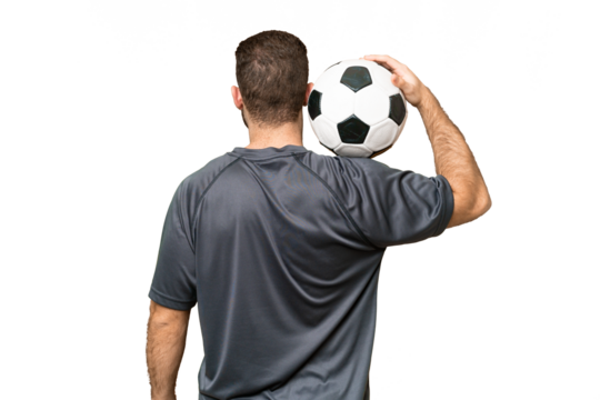 Young handsome blonde man over isolated chroma key background with soccer ball - Powered by Adobe