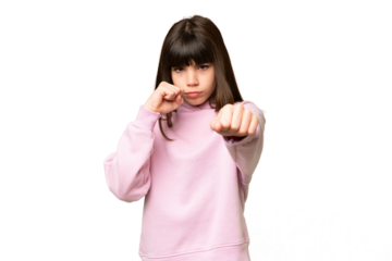 Little girl over isolated green chroma key background with fighting gesture