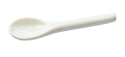 little white ceramic spoon cutout on white background