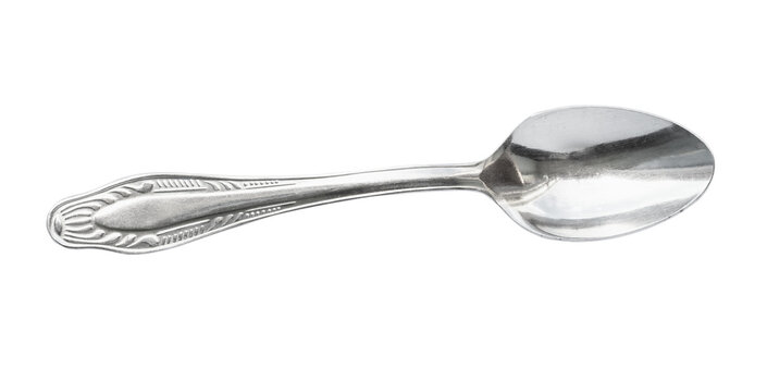 top view of steel coffee spoon cutout on white background
