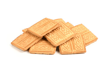 Square shortbread cookies isolated on white background. Stacked butter biscuits for coffee or tee.