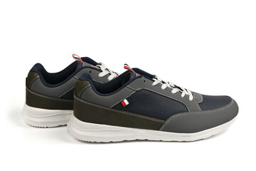 Pair of black fashionable stylish sports casual shoes isolated on white background