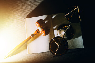 Business and lawyers discussing contract papers with brass scale on desk in office. Law, legal services, advice, justice and law concept picture with film grain effect