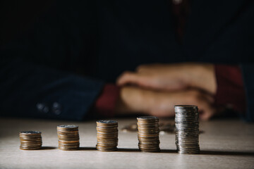 Money, Financial, Business Growth concept, Man's hand put money coins to stack of coins