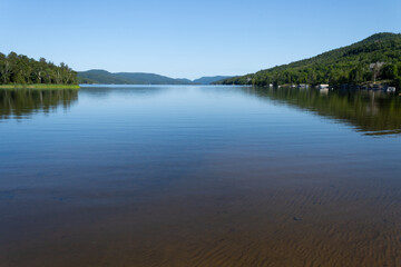 Lac Tremblant - panoramic view of a lake and background mountains, peaceful view