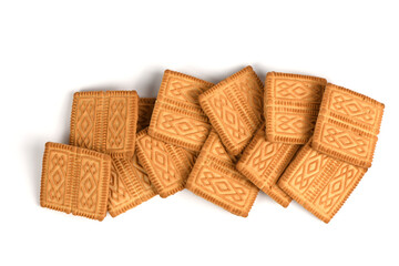 Square shortbread cookies isolated on white background. Stacked butter biscuits for coffee or tee.