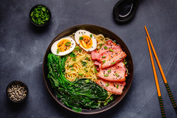Traditional ramen noodle soup with brisket, spinach and egg.