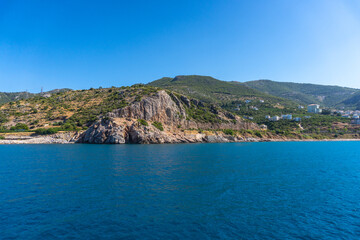 Fototapeta na wymiar Sea waves and fantastic rocky coast diving place Alanya Turkey 