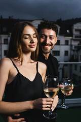 Romantic dinner of a couple in love at night on the roof of the hotel