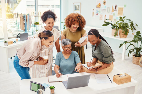 Happy, teamwork or women with laptop for fashion design, planning or draft online for clothing line. Smile, mentor or mature designer speaking, training or talking to people for advice in internship