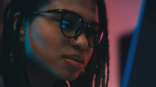 Young woman in glasses opening spam folder on computer, cybercrime, malware