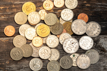 Korean coins placed on a wooden table