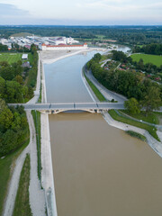 Inn river canal with bridge before new hydro power plant