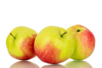 Three sweet juicy apples, macro, isolated on white background.