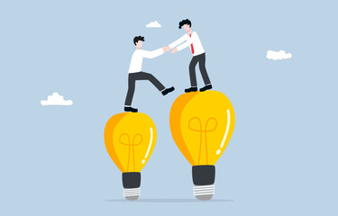 Transferring knowledge or experience to new employee or junior in workplace, mentorship concept, Senior businessman pulling junior up to bigger idea lightbulb.