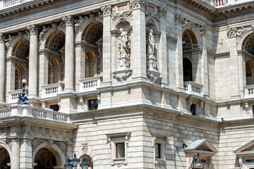 The Hungarian Royal State Opera House located in city center. Beautiful summer day, people on the street in Budapest, Hungary