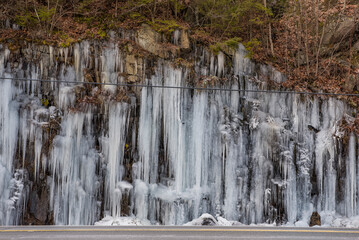 winter icicles on a rocky cliff