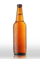 glass bottle with beer in drops