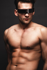 Fototapeta premium Male beauty concept. Portrait of handsome young man. Perfect hair and skin. Studio shot