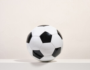 A soccer ball on a white surface. Football concept. Sport and healthy.