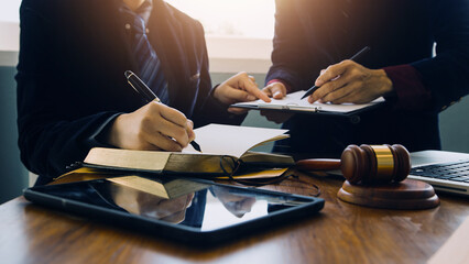 Businessman and Male lawyer or judge consult having team meeting with client, Law and Legal services concept.