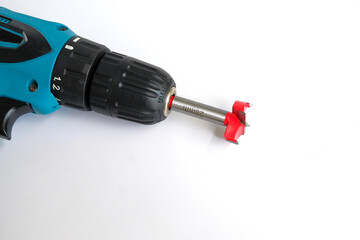 Boring cylindrical hole into wood, bit drilling a large hole.