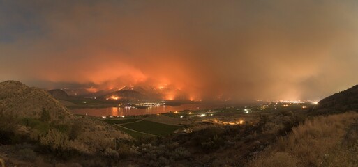 Blazing orange and yellow sky caused by a wildfire near Osoyoos Lake, British Columbia, Canada