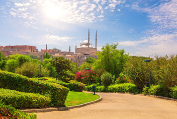 Al-Azhar Park by the Great Mosque of Muhammad Ali Pasha or Alabaster Mosque, top place of visit in Cairo, Egypt - obrazy, fototapety, plakaty