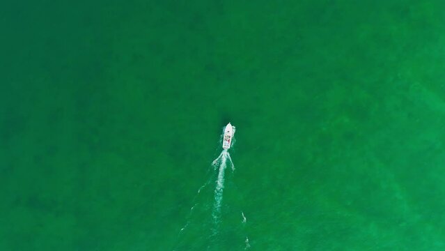 Aerial view of a boat sailing on Lago di Garda, Italy