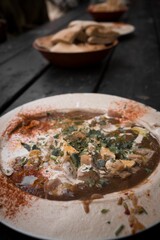 Close-up of a bowl of freshly-made hummus traditional to Tel Aviv, Israel