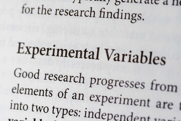 Close-up of the scientific research term Experimental Variables on paper background